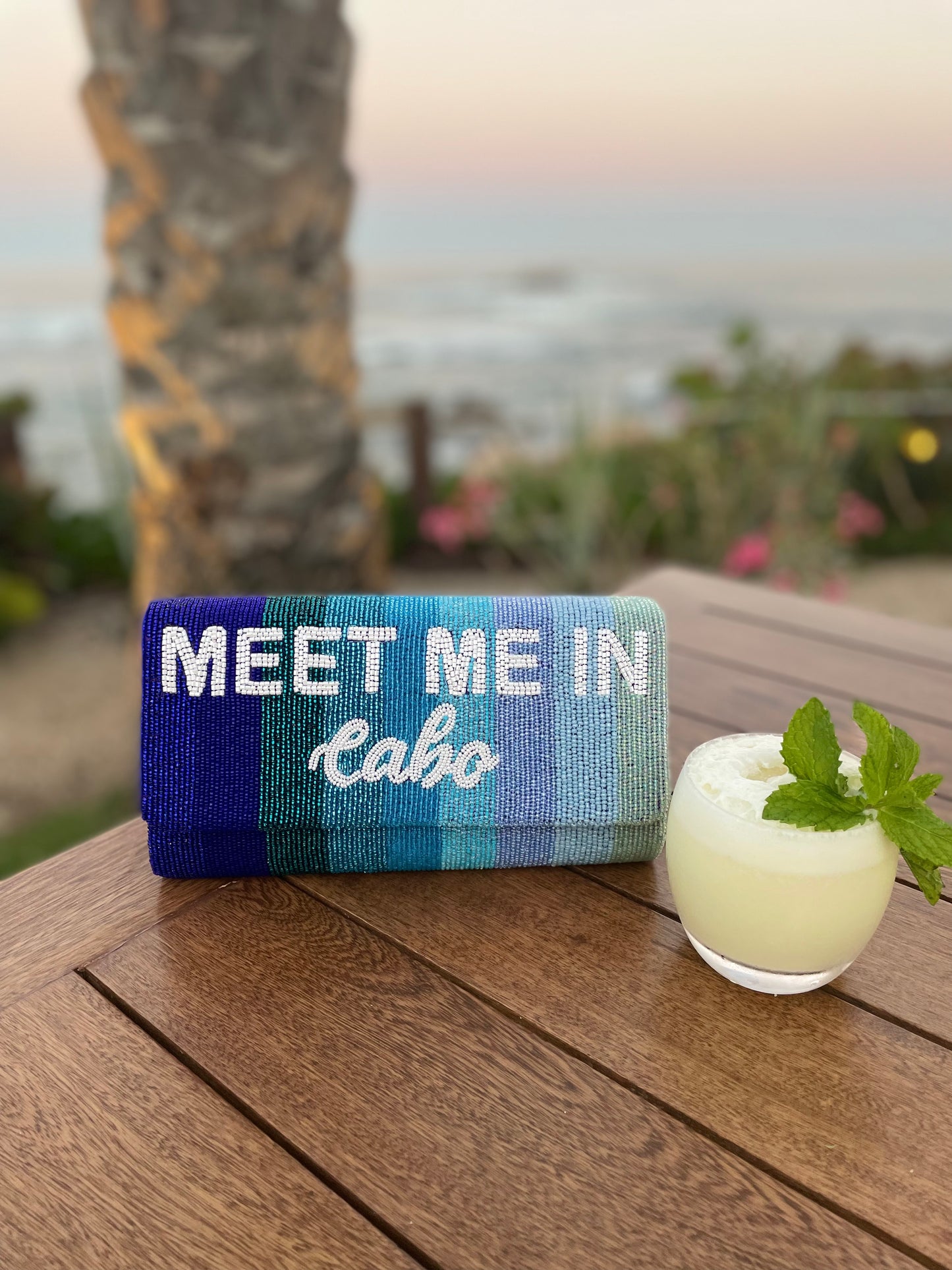 Meet Me In Cabo Ombré Blue Stripe Clutch