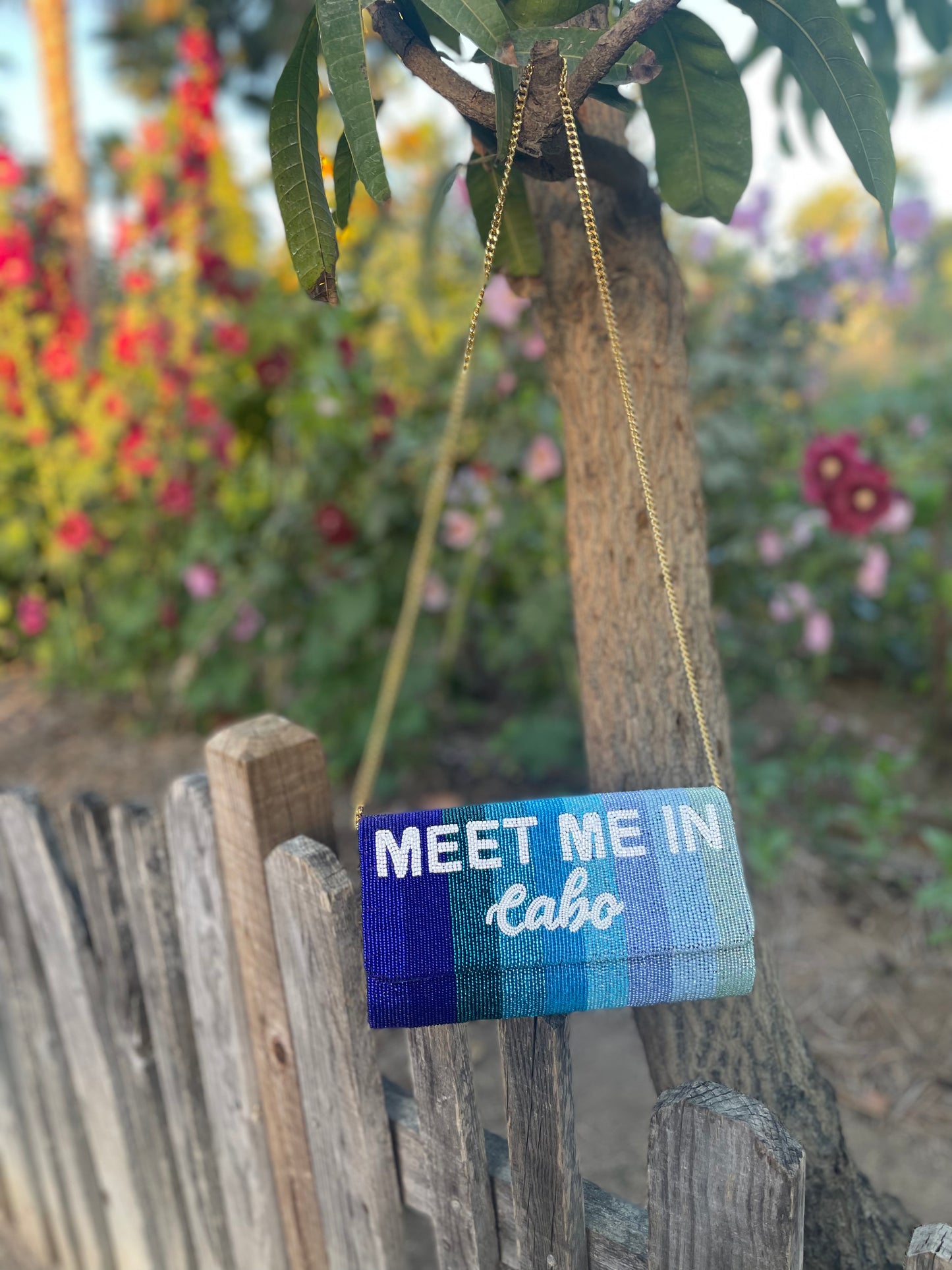 Meet Me In Cabo Ombré Blue Stripe Clutch